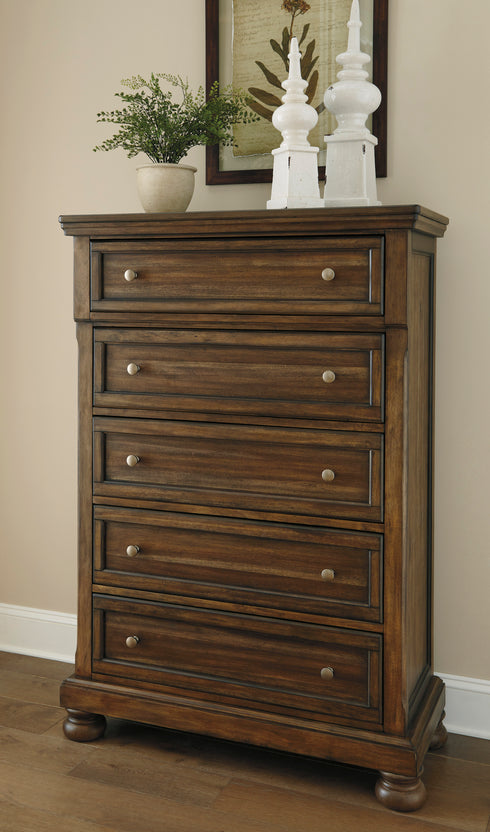 Flynnter Medium Brown Five Drawer Chest