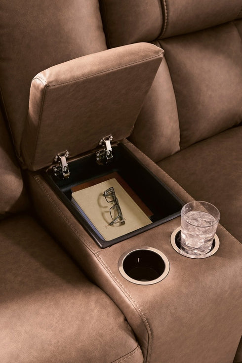 Mackmenville Caramel Reclining Loveseat w/ Console - WCC Furniture & Mattress Center Lafayette & Lake Charles