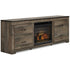 Trinell Brown Large TV Stand w/ Fireplace - WCC Furniture & Mattress Center Lafayette & Lake Charles