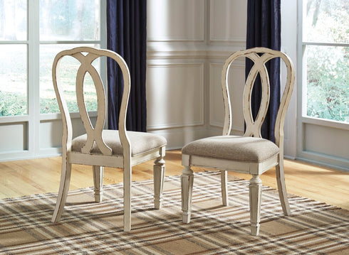 Realyn Chipped White Dining UPH Side Chair (Set of 2) - WCC Furniture & Mattress Center Lafayette & Lake Charles
