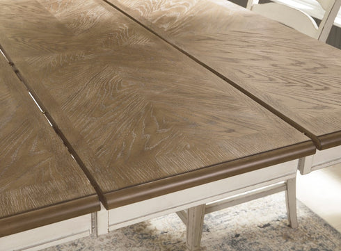 Realyn Chipped White Oval Dining Room EXT Table - WCC Furniture & Mattress Center Lafayette & Lake Charles