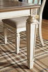 Realyn Chipped White Rectangular Dining Room EXT Table - WCC Furniture & Mattress Center Lafayette & Lake Charles