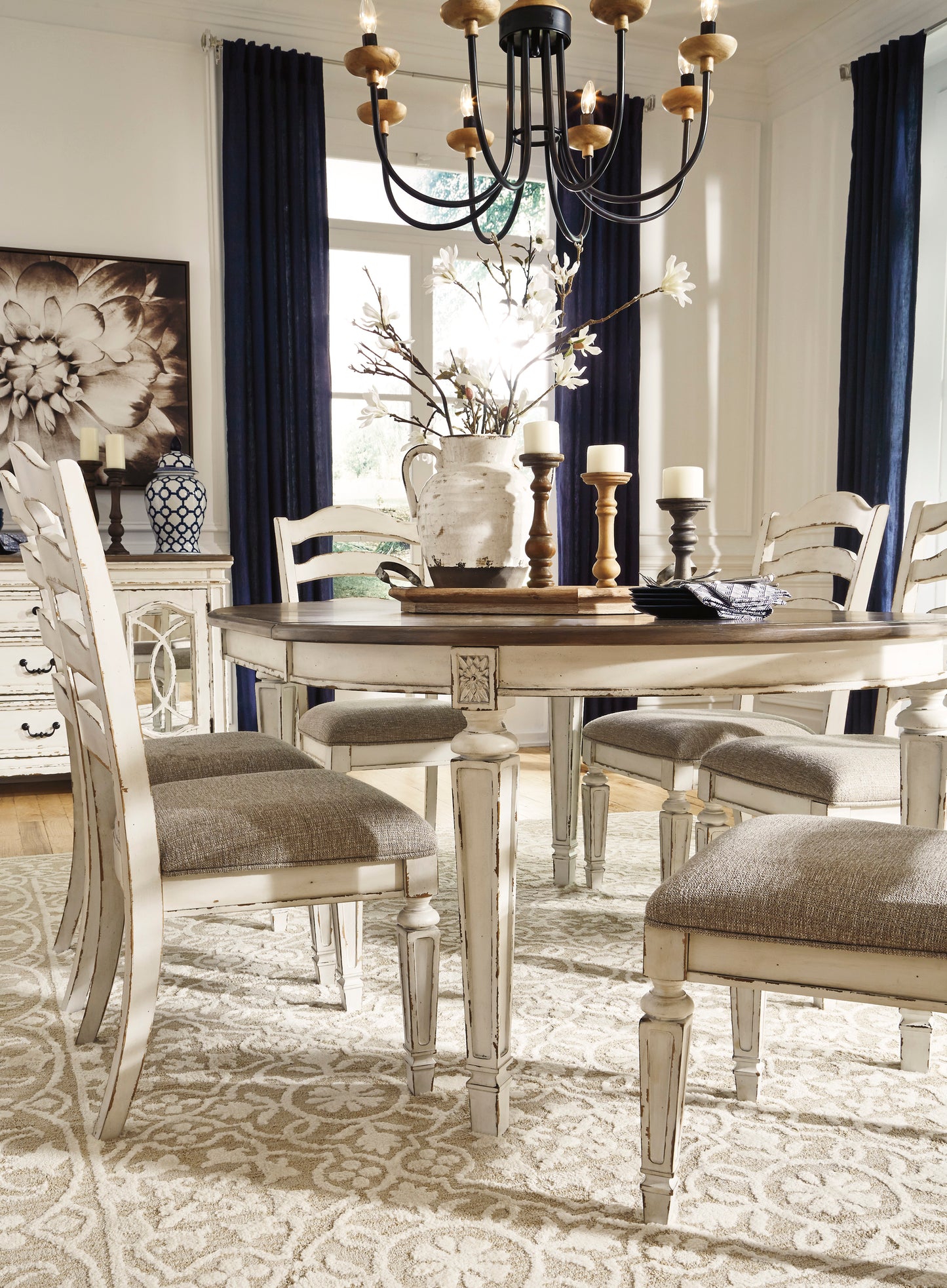 Realyn Chipped White 7 Pc. Oval Table Set